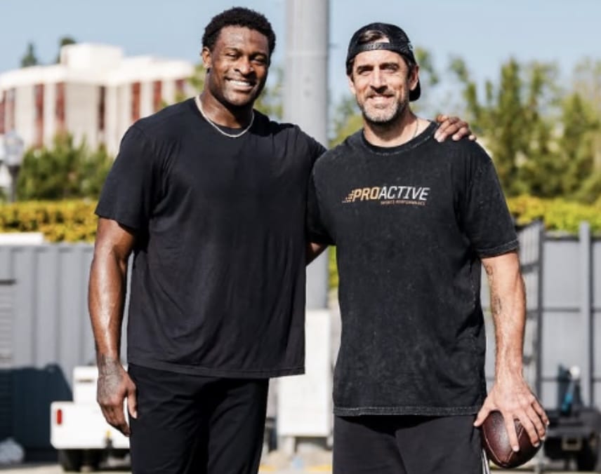 Aaron Rodgers and DK Metcalf pose for a photo.