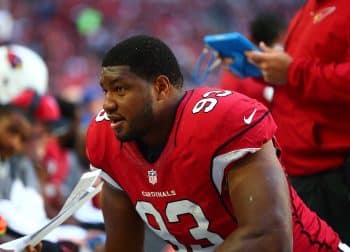 Calais Campbell sits on the sideline.