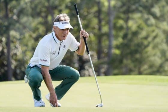 Bernhard Langer lines up his putt on no. 18.