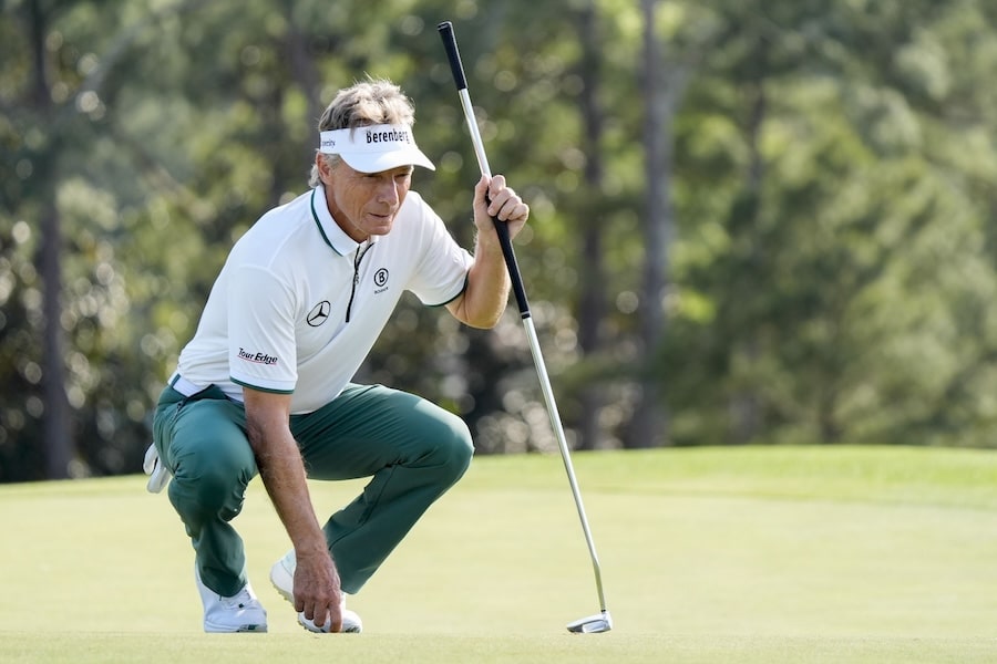 Bernhard Langer lines up his putt on no. 18.