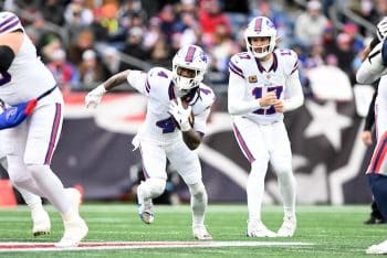 Buffalo Bills running back James Cook runs the ball.