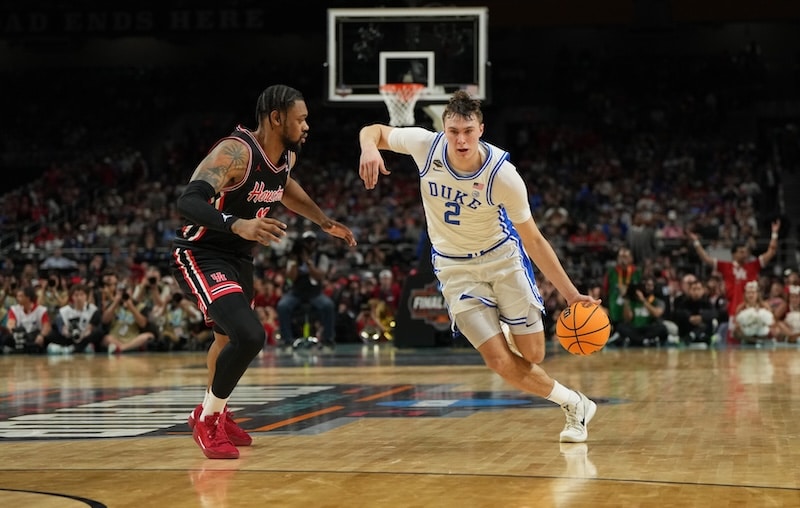 Duke Blue Devils forward Cooper Flagg dribbles the ball.