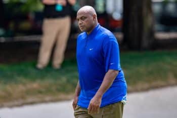 Former NBA player Charles Barkley walks down the course.