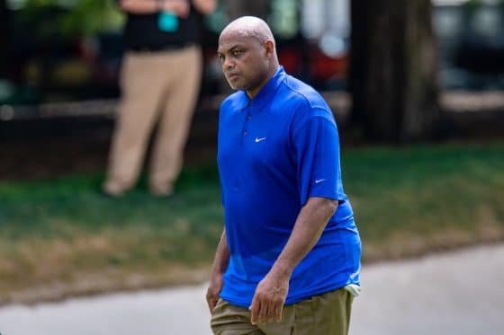 Former NBA player Charles Barkley walks down the course.