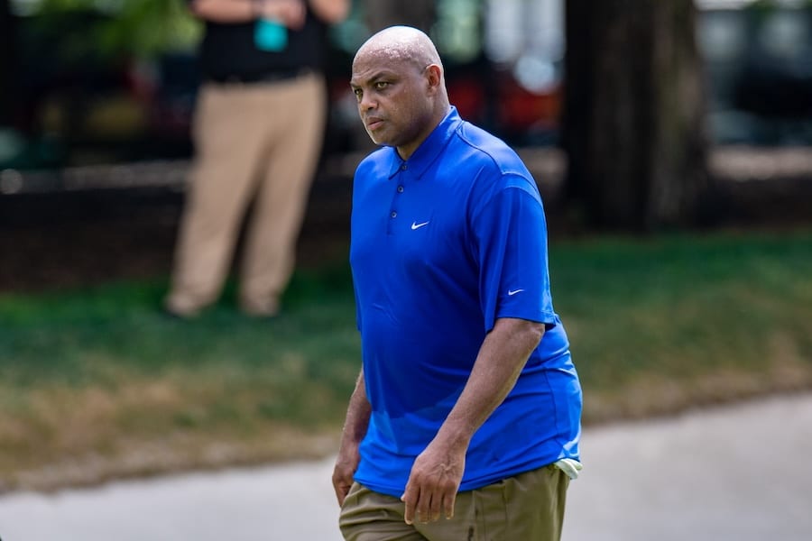 Former NBA player Charles Barkley walks down the course.