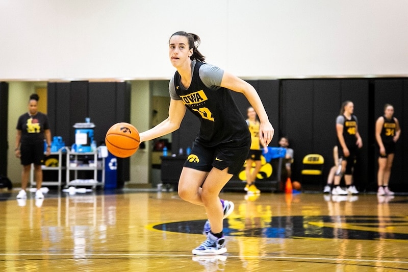 Iowa guard Caitlin Clark dribbles during a summer NCAA women's basketball practice.