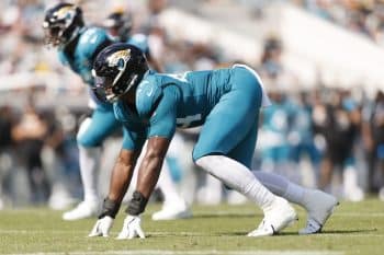 Travon Walker lines up on the line.