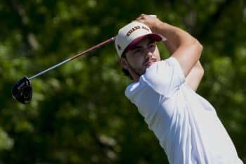 Jose Luis Ballester swings a golf club.