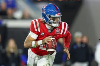 Mississippi Rebels quarterback Jaxson Dart runs with the ball.