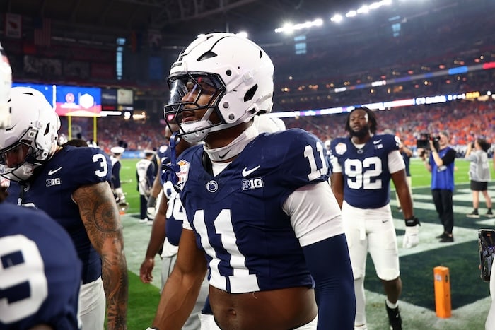 Abdul Carter stands in the end zone.