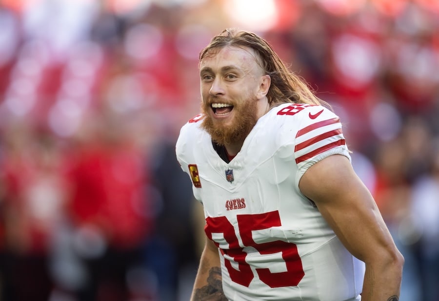 George Kittle runs down the field.