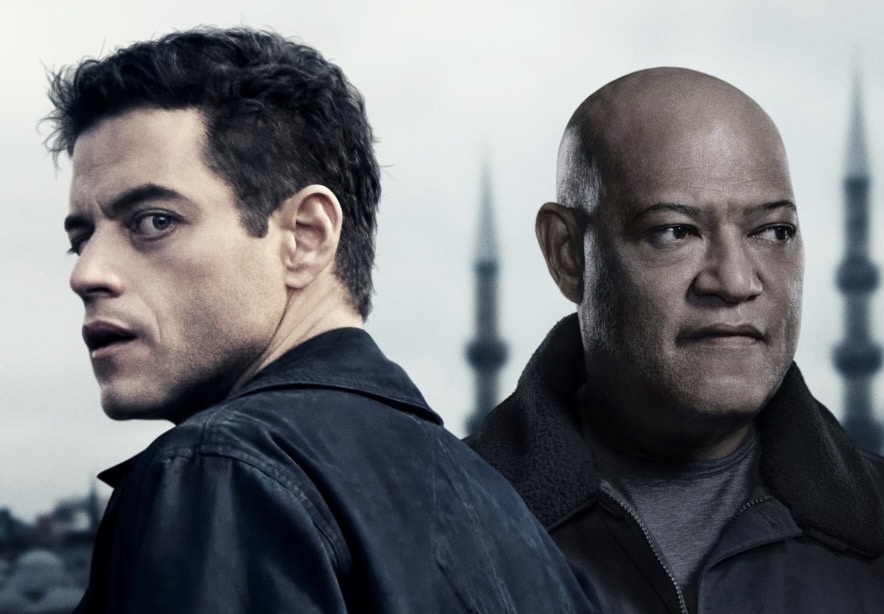 Rami Malek and Laurence Fishburne stare in opposite sides.