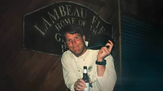 Brett Favre holds a beer.