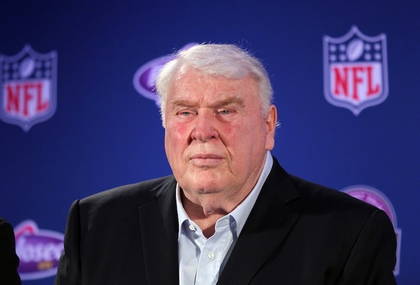 John Madden stands and stares.