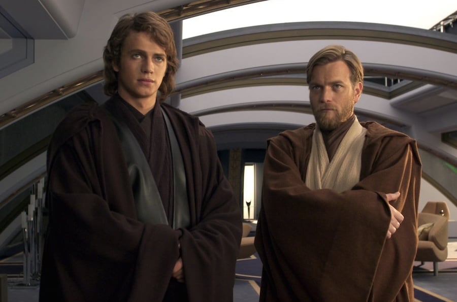 Two Jedi stand next to each other.