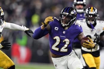 Derrick Henry runs the ball for the Ravens.