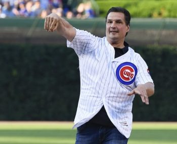 Eddie Olczyk throws the first pitch.