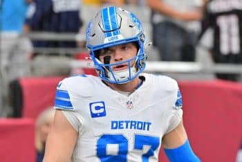 Aidan Hutchinson of the Detroit Lions stands on the field.
