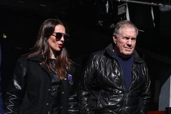 Jordon Hudson and Bill bElichick walking next to each other.