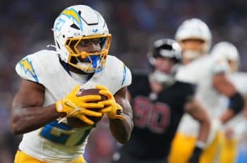 Los Angeles Chargers running back J.K. Dobbins runs the ball.