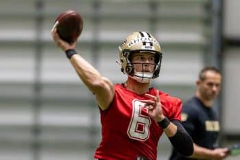 New Orleans Saints quarterback Tyler Shough throws the ball.