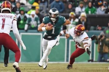 Philadelphia Eagles quarterback Jalen Hurts runs the ball.