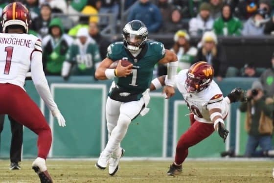 Philadelphia Eagles quarterback Jalen Hurts runs the ball.