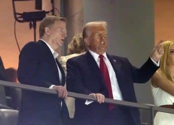 Roger Goodell talks with Donald Trump.