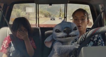 Stich drives a car with Lilo.