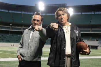 Two men point their rings in Madden.
