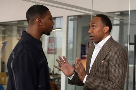 Stephen A. Smith talks to another man in Law & Order.
