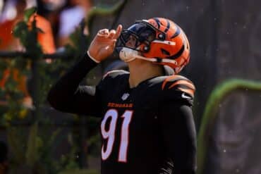 Trey Hendrickson puts his finger up to his mouth.