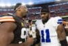 Myles Garrett claps hands with Micah Parsons.