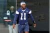 Dallas Cowboys defensive end Micah Parsons walks out of the locker room.