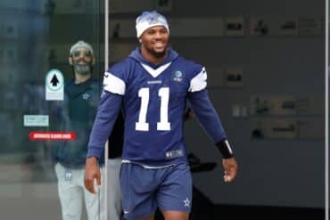 Dallas Cowboys defensive end Micah Parsons walks out of the locker room.