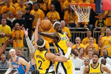 Pascal Siakam grabs the ball in the Pacers game.