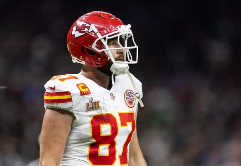 Travis Kelce walks off the field.