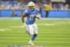 Los Angeles Chargers running back J.K. Dobbins runs the ball.