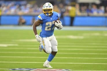 Los Angeles Chargers running back J.K. Dobbins runs the ball.