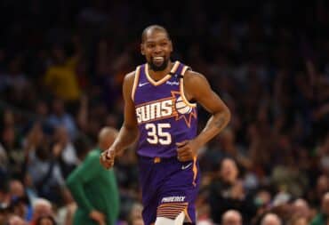 Kevin Durant runs up the court.