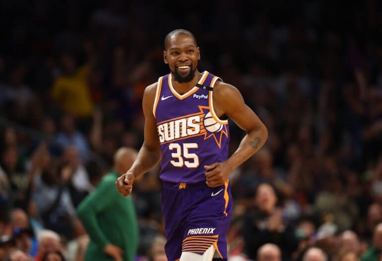 Kevin Durant runs up the court.