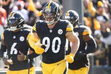 T.J. Watt runs on the field.