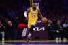 LeBron James dribbles the ball.
