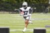 Miles Sanders runs the ball.