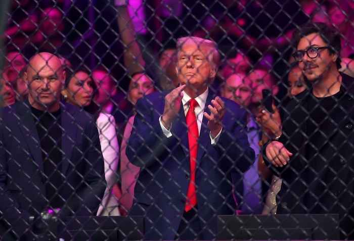 Donald Trump goes to clap his hands.