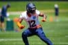 Broncos Jahdae Barron runs around.