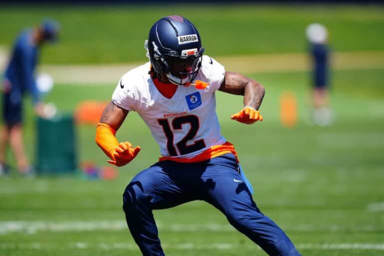 Broncos Jahdae Barron runs around.