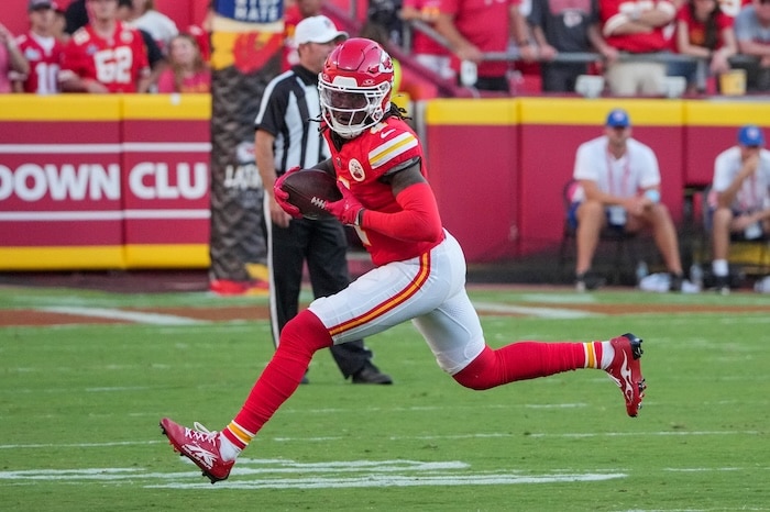 Rashee Rice runs with the ball.