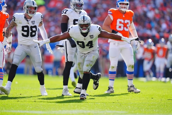 Las Vegas Raiders defensive tackle Christian Wilkins runs on the field.