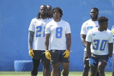 Los Angeles Chargers running backs Najee Harris (22), Omarion Hampton stand at practice.